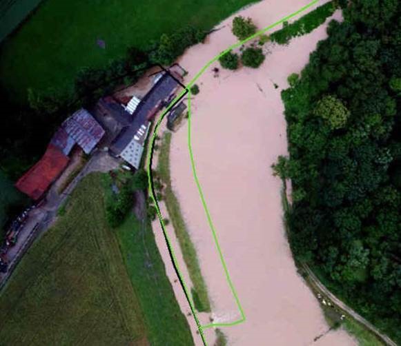 Een boerderij net over de grens met Wallonië is overstroomd, opwaarts van het gecontroleerd overstromingsgebied (GOG) in Herne.